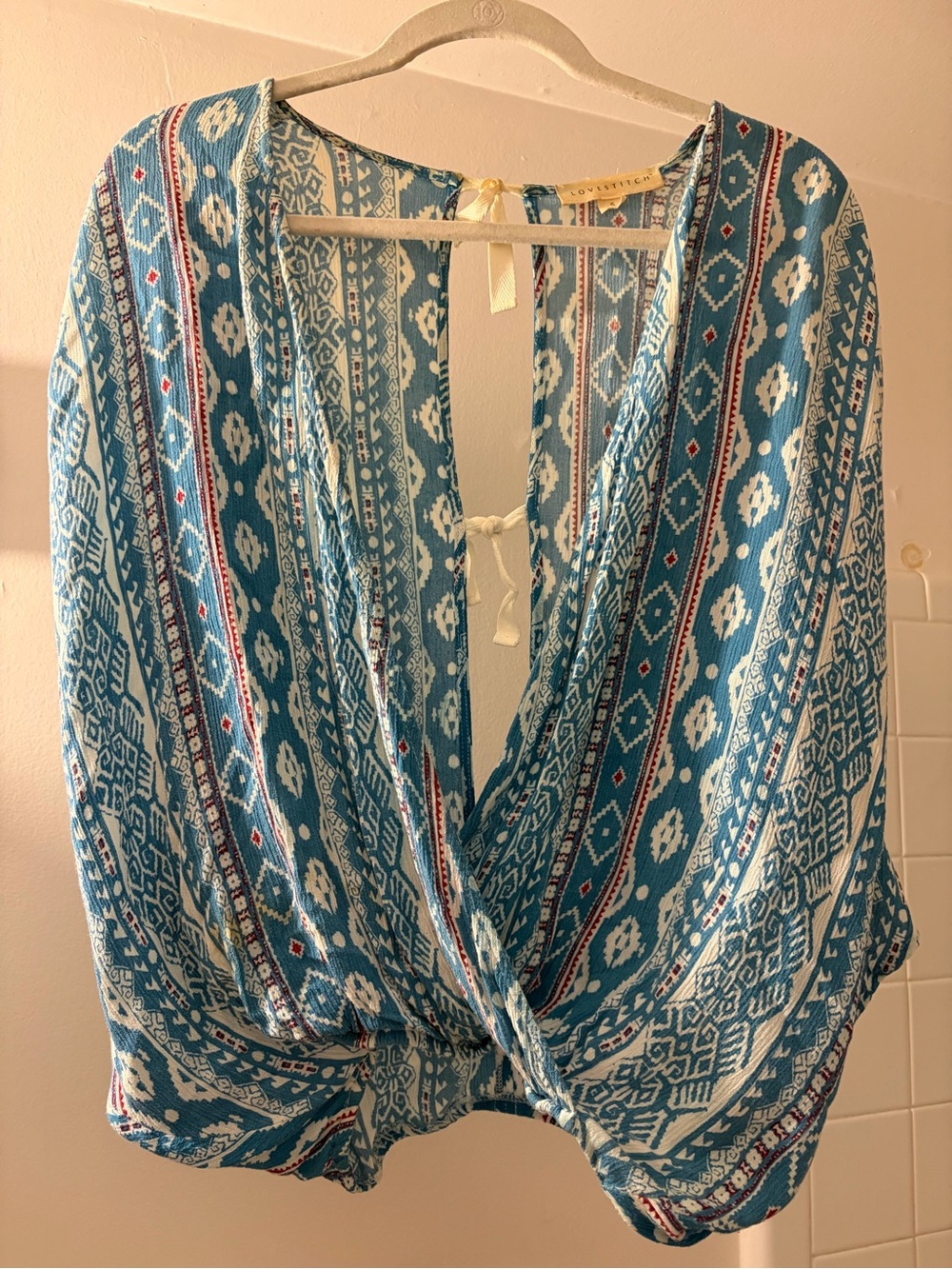 Lovestitch Turquoise and White Printed Wrap Blouse with Violet Accents